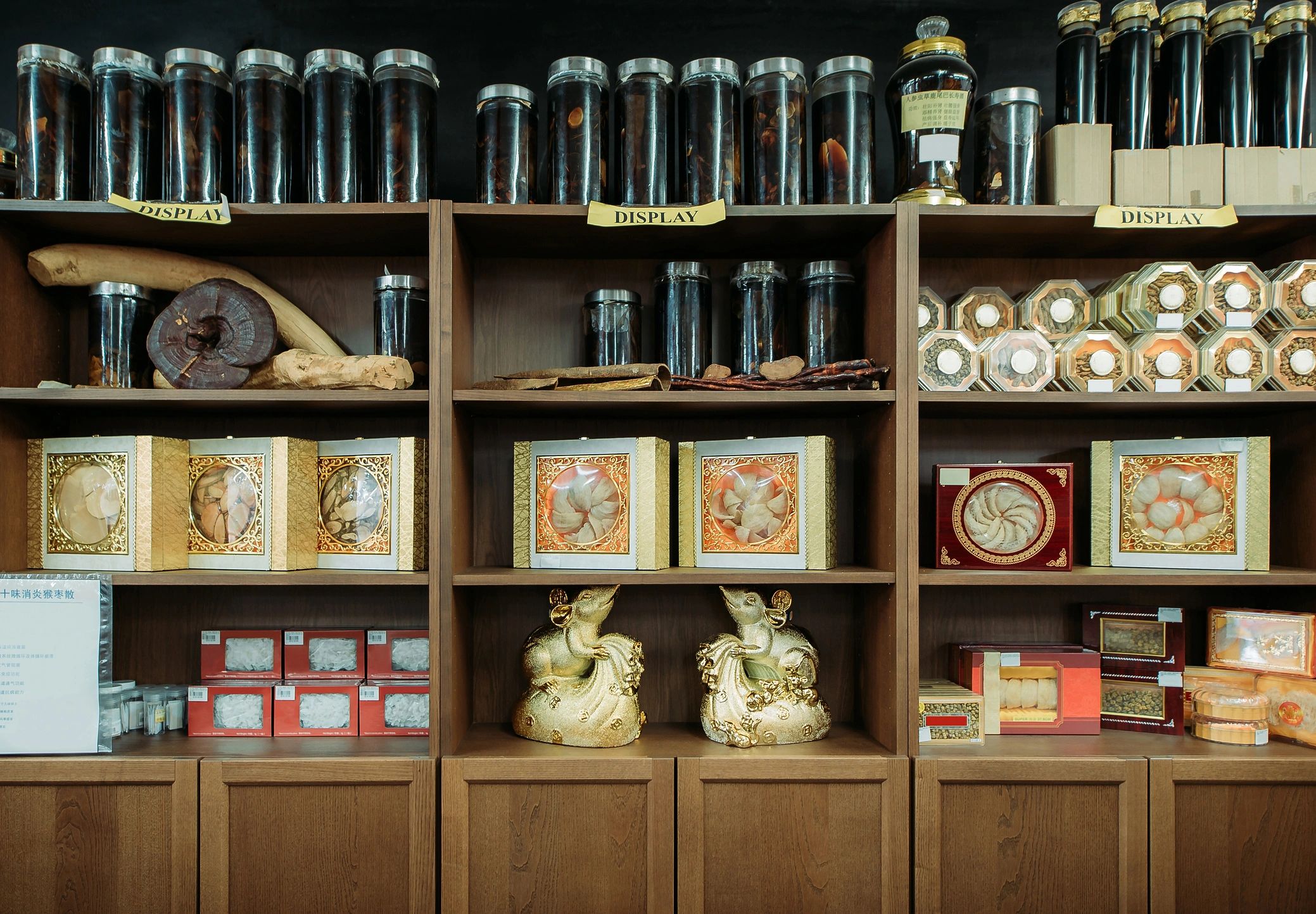 Shelves of traditional dried herbs in jars