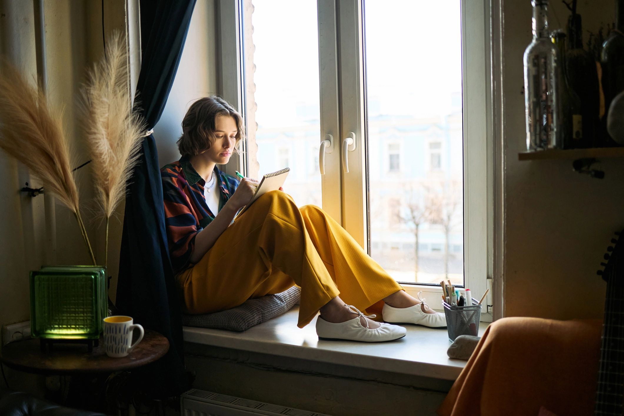 Woman journaling for self mastery practice